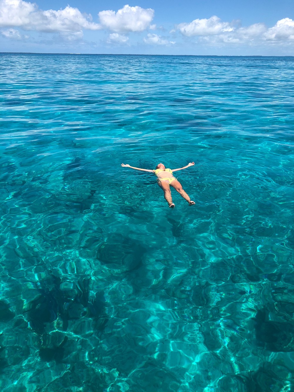 Guests floating on a Key West backcountry sandbar